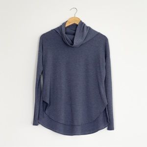 Medium blue casual top. Long sleeved